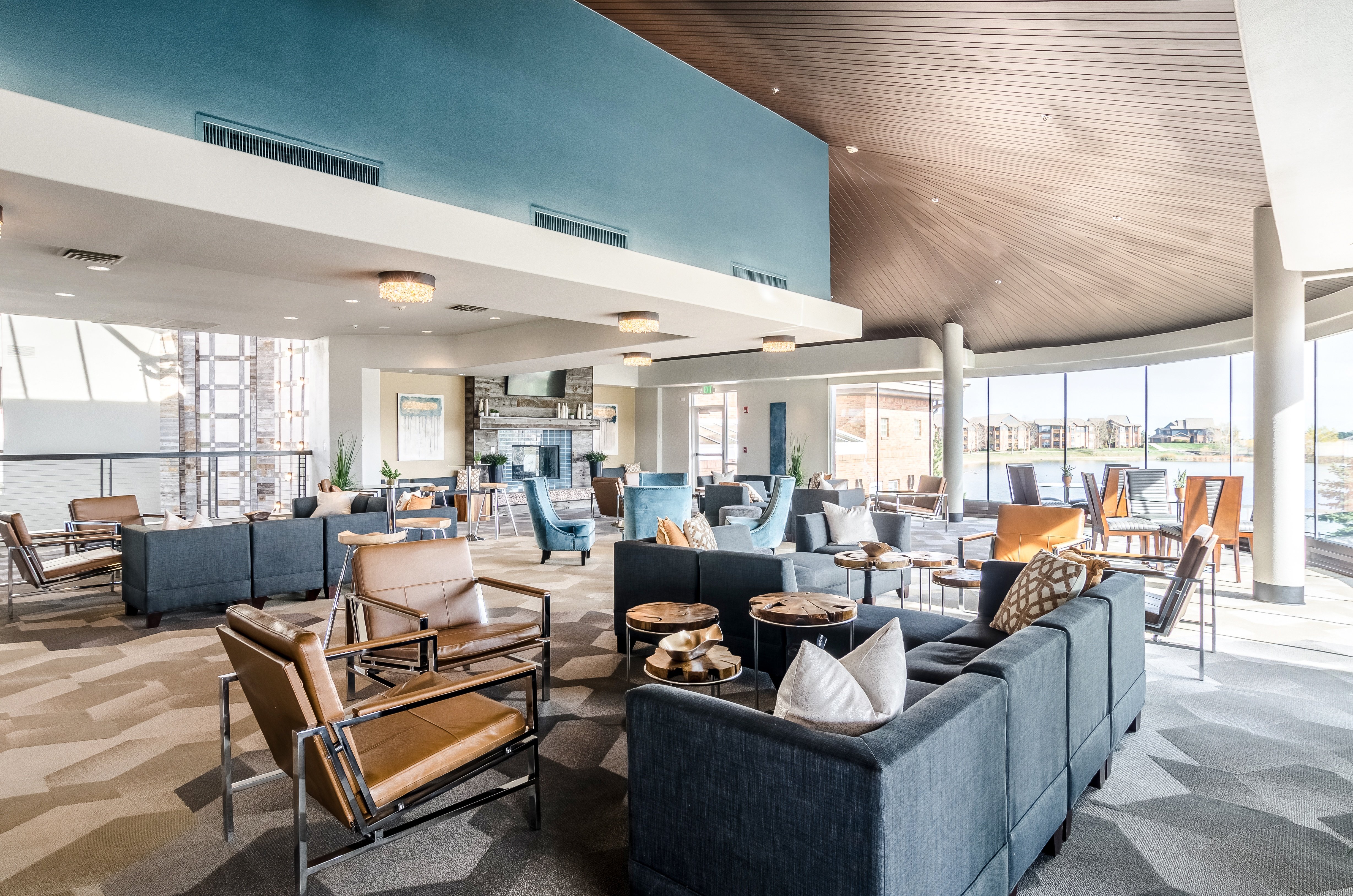 A large room with a lot of chairs and couches.